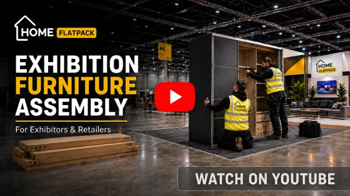 Furniture installers assembling display wardrobes for an exhibition